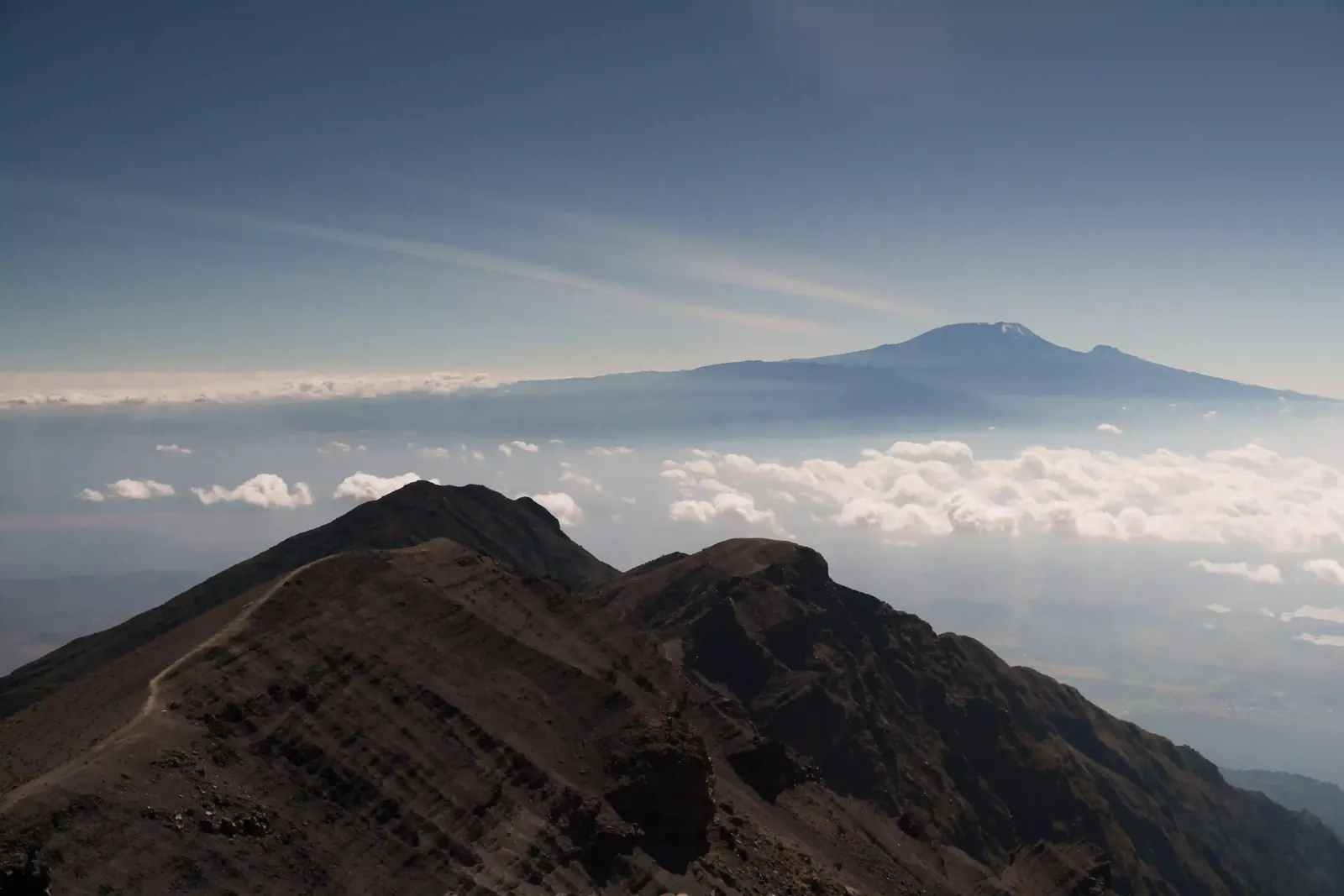 Kilimanjaro above the clouds, seen from the ridge of Mount Meru